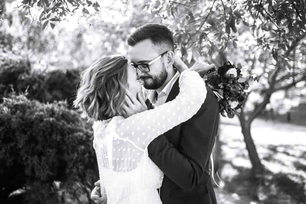 beautiful black white photo bride groom happy couple posing smiling wedding dress (1)